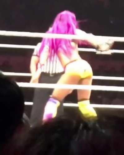 Sasha Banks giving Emma a stinkface 