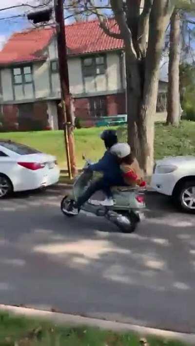 Looks at camera before checking on her