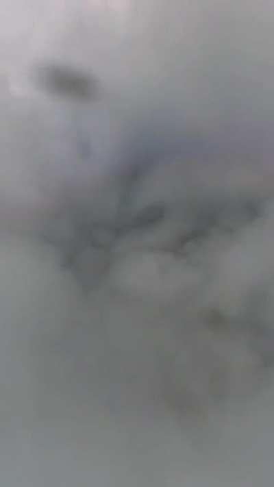 Skydiving into a 14,000 ft thunder cloud.