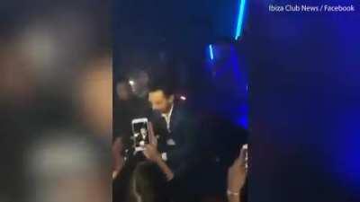 man lost his grip on a £30,000 Jeroboam of Champagne, spilling every drop on the floor of an Ibiza night club.