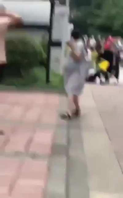 Man on acid bites people in public in china