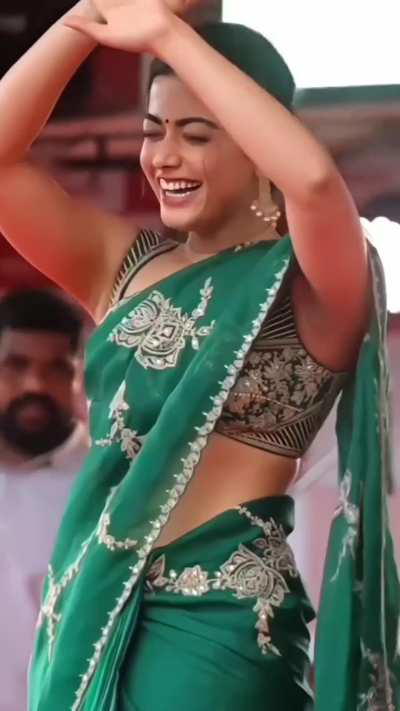 South Slut Rasmika Mandhana showing her dark sweaty armpits in public to make the crowd madly in lust for her 