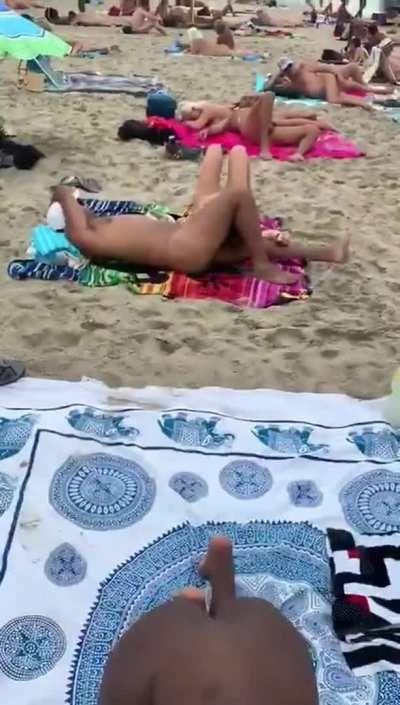 Shameless blowjob on a beach