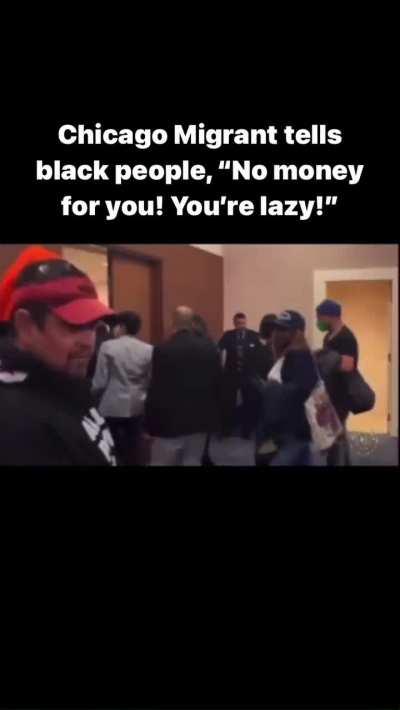 Chicago migrant gets into a argument with a black woman