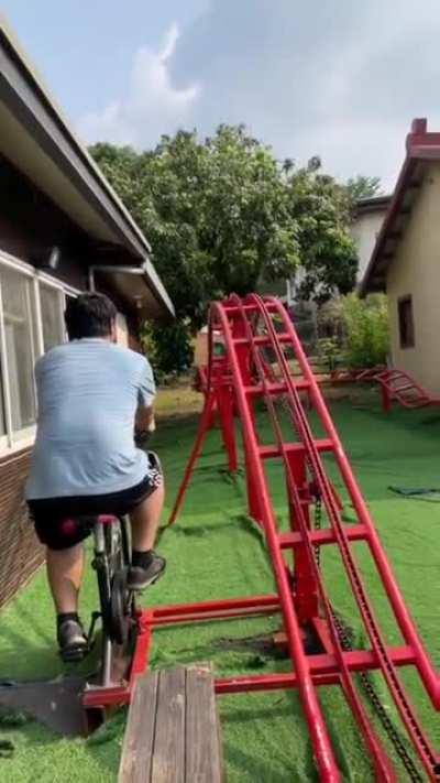 A bicycle powered mini roller-coaster.