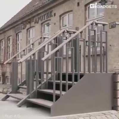 Wheelchair lift and stairs in one.