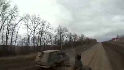 While driving in the Kursk direction, a russian FPV drone was spotted approaching, the Ukrainains quickly leave the vehicle and shoot down the fpv