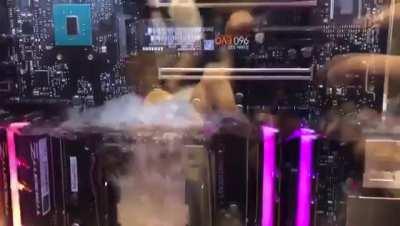 PC Submerged In Cooling Liquid Built by Der 8auer.