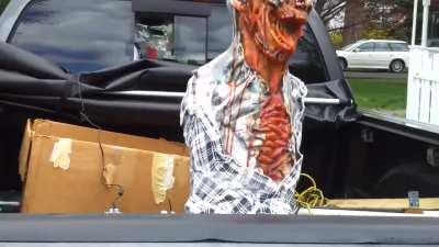 Motorized zombie for zombie response vehicle. How many people am I going to freak out at a red light before getting a ticket of some sort?