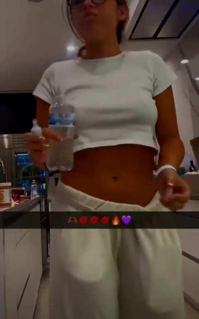 nat with no bra and shows off ass