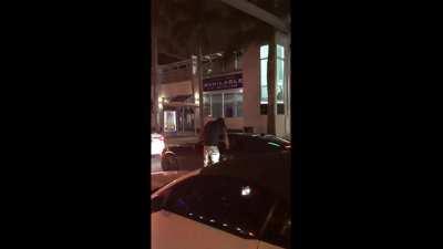 White girl pleasing a random black bull in the street.