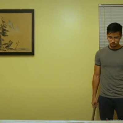 Video game player tries to solve a Rubik’s Cube!