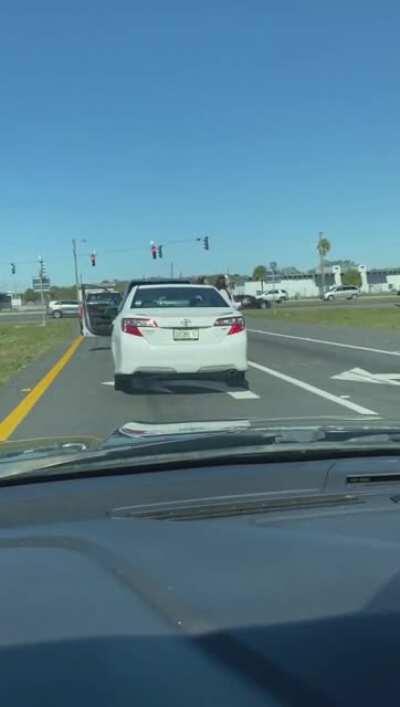 Florida woman shoots at man during fender bender.