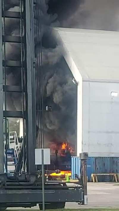 A container handler caught on fire today.
