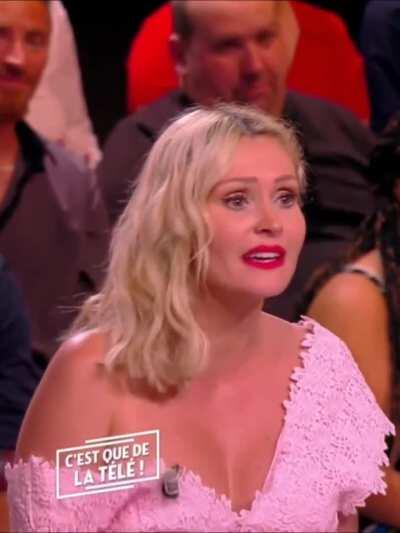 Nip Slip on French TV. Well, more like a tit slip.