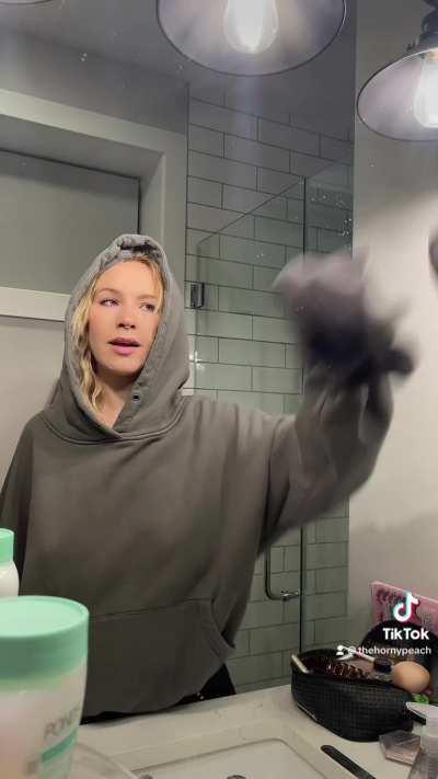 Clean mirror with a dirty girl behind it