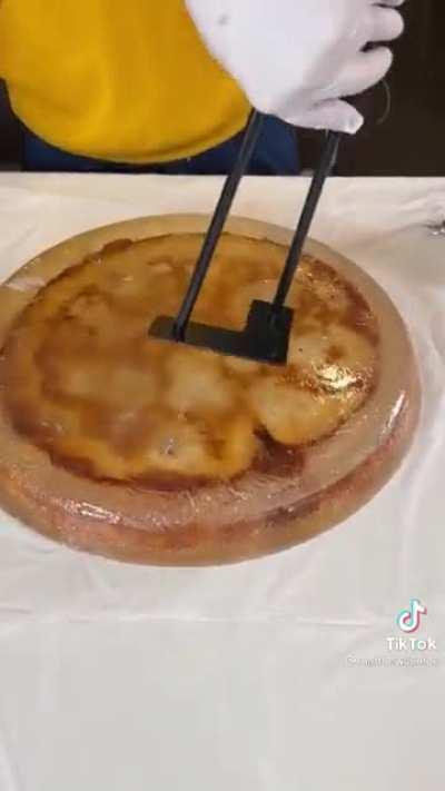 A pizza table... For your... Pizza??