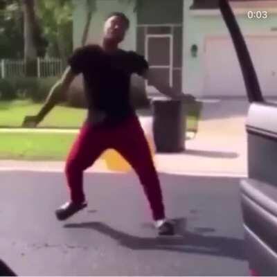 Doing a challenge in the middle of the road .