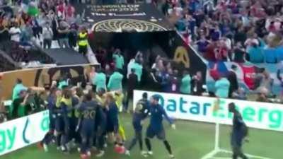 Can someone explain what's going on here? Why's he being stopped from celebrating?