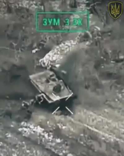 A Russian BMP is getting attacked by a Ukrainian UAV while soldiers are unloading. The driver of the vehicle panics and starts moving the IFV while the infantry is not at a safe distance.