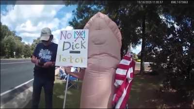 Cops threw a grandma to the ground and arrested her for wearing a penis-shaped costume at an anti-Trump protest in Alabama, USA.