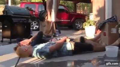 Standing on a person with a pogo stick