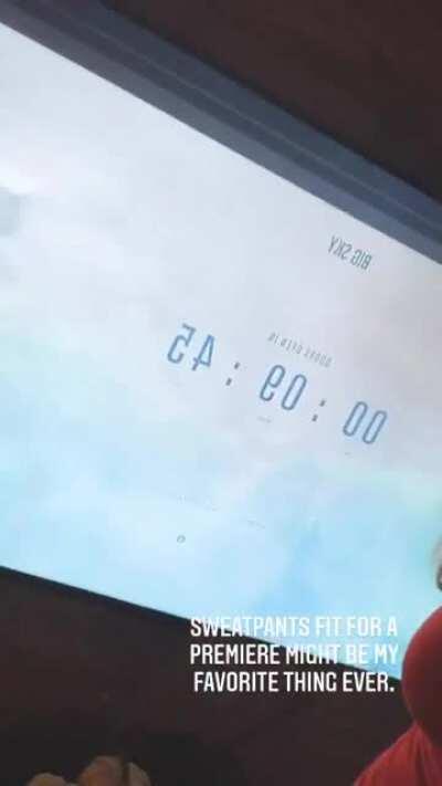 Red top and sweatpants. Straight fire.