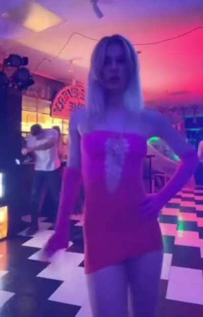 Blonde showing off her dress