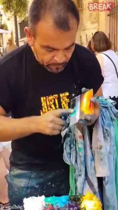 Man creates amazing finger paintings.