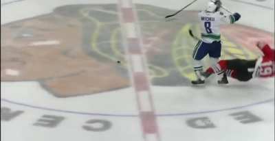 Willie Mitchell hit on Jonathan Toews (some how pronounced Tavves)