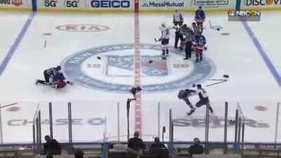 Hockey teams waste no time, immediately start fighting eachother at the start of the game