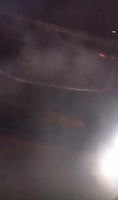 Dude drifts car until it lights on fire