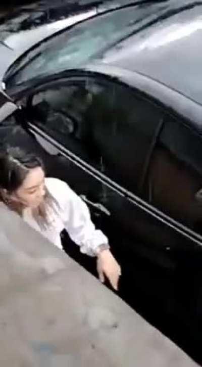 Angry girlfriend destroys car