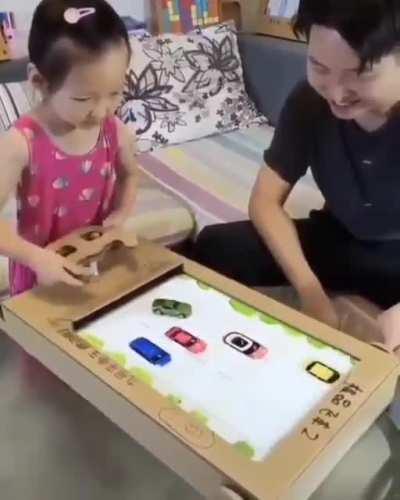 Dad made this game from cardboard for his daughter