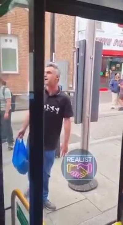 Racist British man racially abuses and spits at a Muslim bus driver