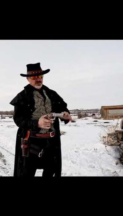 Quad shooting a revolver