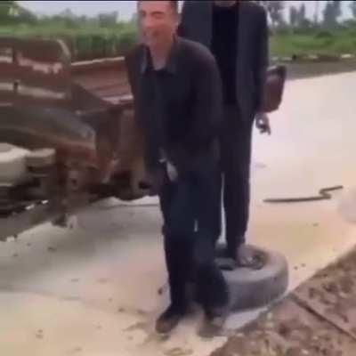 Trying to remove a tyre.