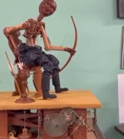 Some kind of Automata that shoots a bow!