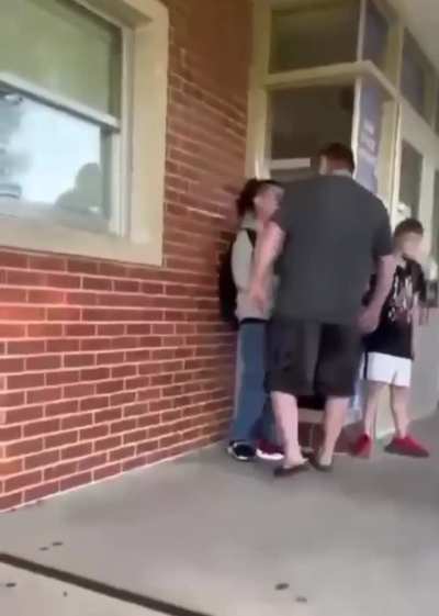 A father confronts his son's bully. Another kids defuses the situation creatively.
