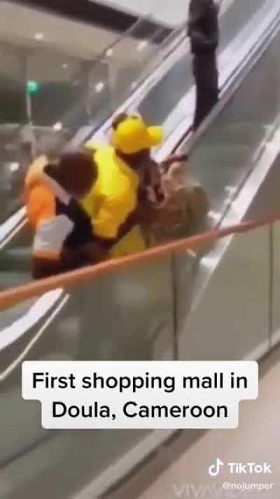 People using escalators for the first time in their lives