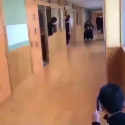 What could go wrong while riding through school corridors?