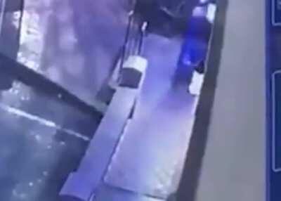 Bouncer successfully fights off a guy with a gun