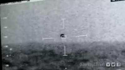 2019: US Navy films “SPHERICAL” shaped UFO going into the water; here is that footage