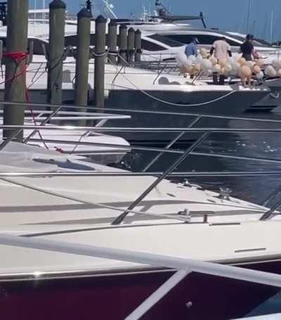 Scumbags pop balloons directly into the ocean after a yacht party