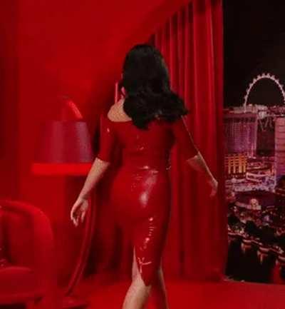 Latex queen Katy Perry bouncing around in a red dress