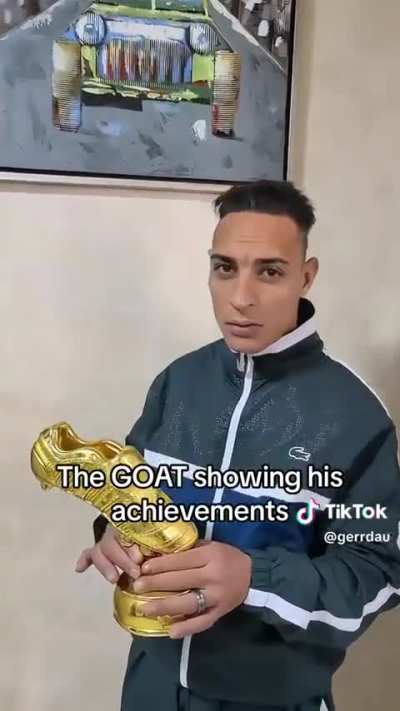 The 🐐 showing off his trophy(s) (proof of anthony prime on 2008)