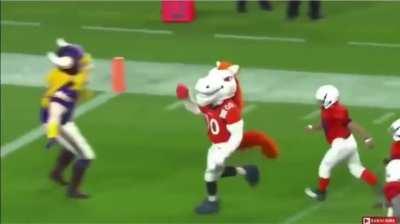 Mascots vs children football game