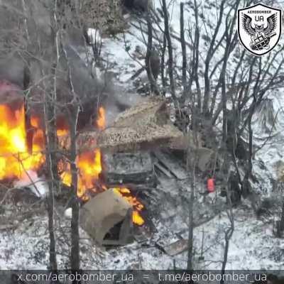 ruzzian camp and car get burned down by drone dropped grenades. Visibly frustated ruzzian on location.