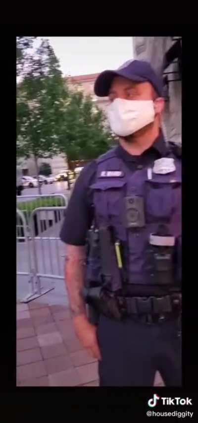 Protester has a joke for the police officers