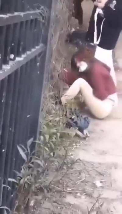 well, at least she still has her mask on.